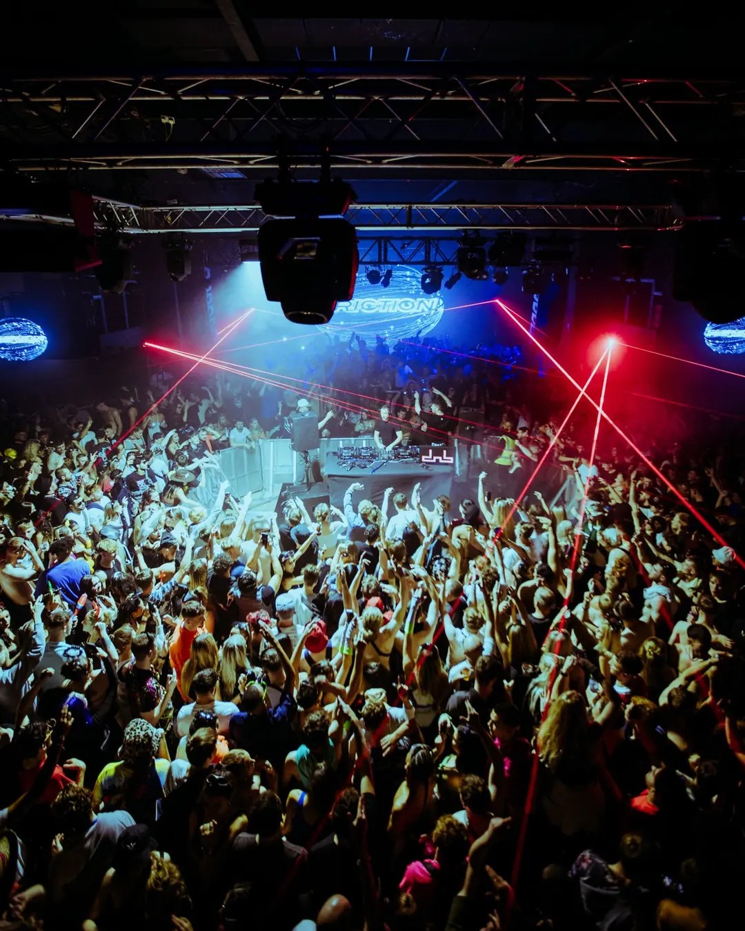 DnB Allstars 360: Birmingham: Elevated view over a rammed crowd with lasers overhead, great sense of scale