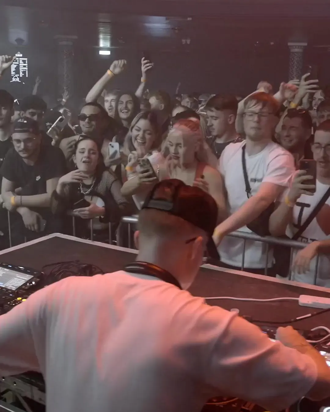 DnB Allstars 360: Liverpool: DJ in a cap faces a packed Liverpool crowd from the booth