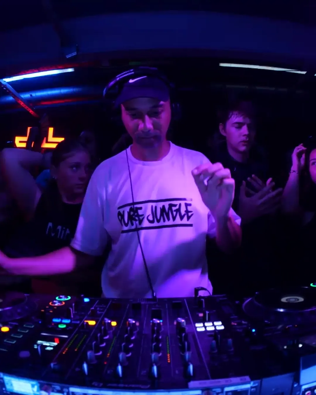 DnB Allstars 360° w/ Sub Focus: Jungle-shirt DJ mixing inside the 360 ring
