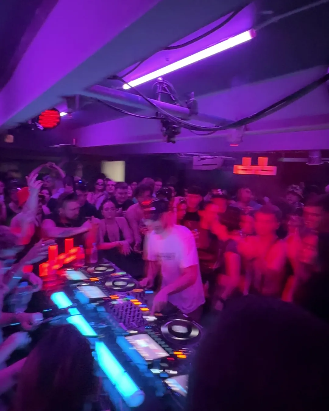 DnB Allstars 360° w/ Turno: overhead view of a purple-lit crowd around the 360 decks