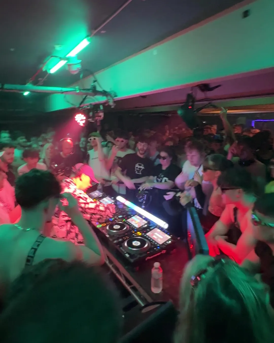 DnB Allstars 360° w/ Andy C: teal light over the booth and a packed 360 room