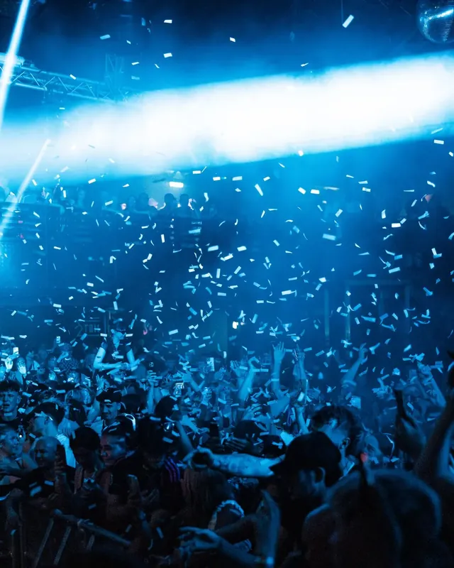 DnB Allstars 360: Nottingham: Blue confetti storm raining over a packed crowd