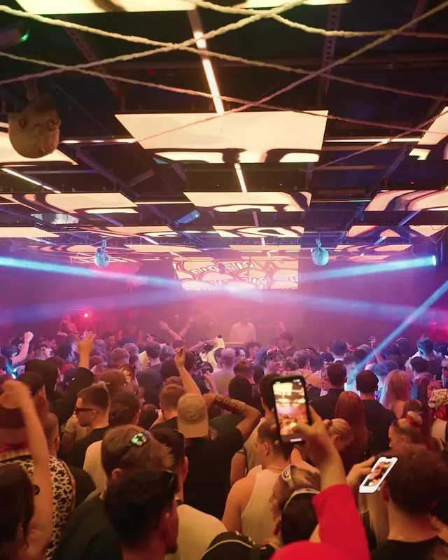 DnB Allstars Halloween: Leeds: warm light and phones up across the Leeds Halloween crowd