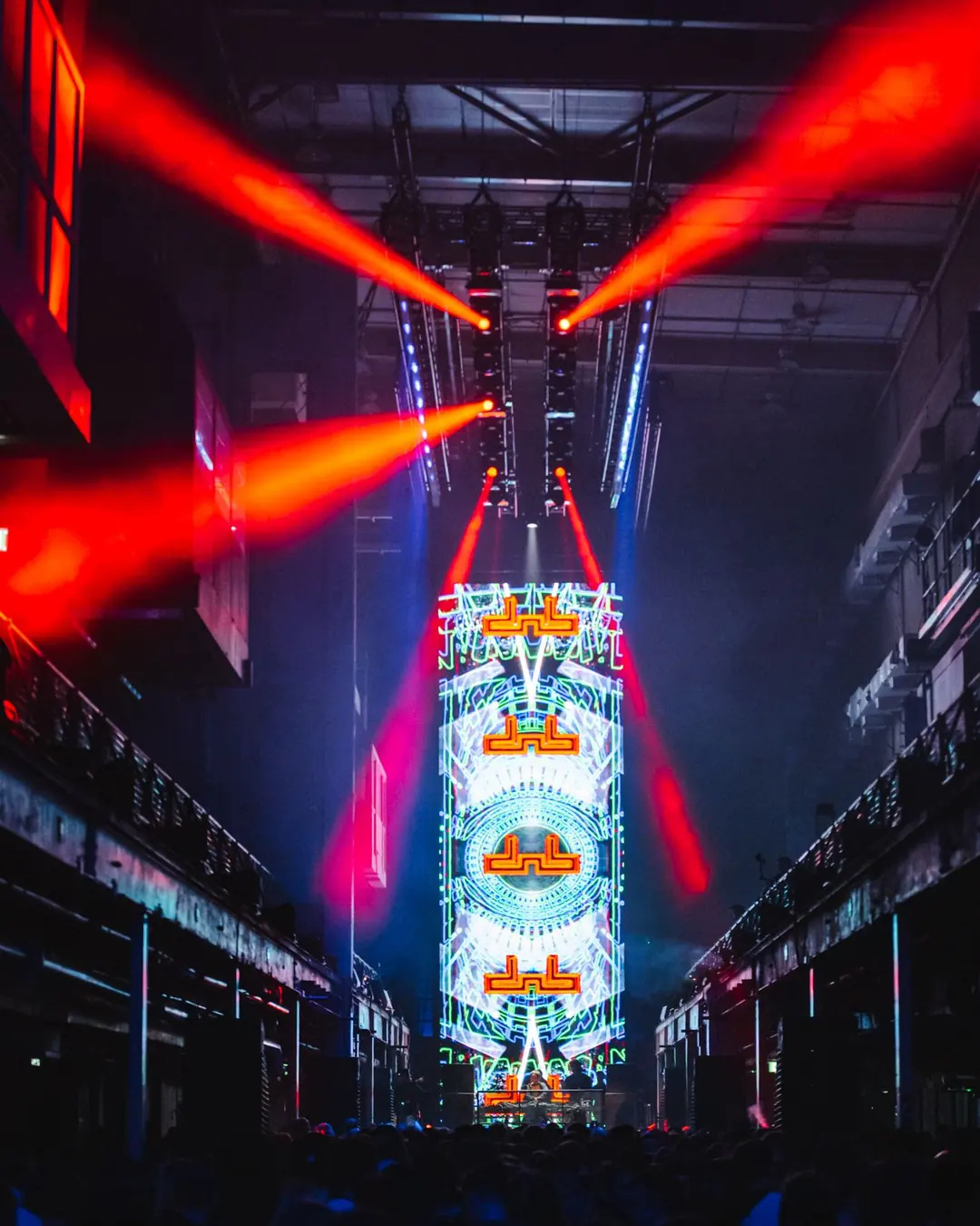DnB Allstars: Printworks London (Round Two): Red lasers and dnb-logo screen down symmetrical Printworks hall, strong brand read