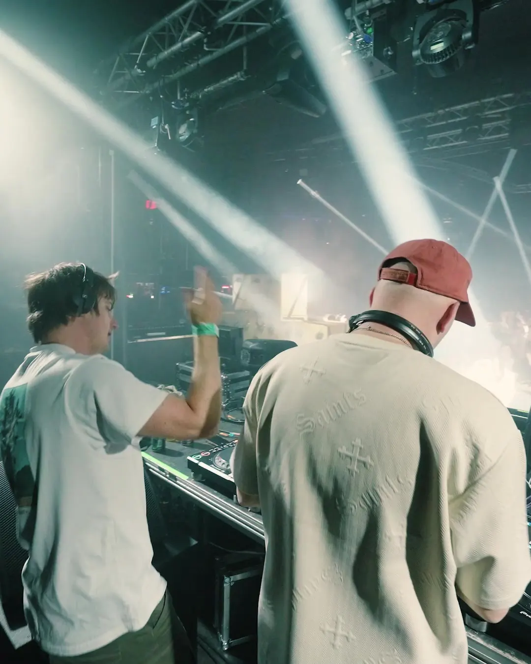 DnB Allstars x 30Hz: Nottingham: two DJs at the decks under white beams