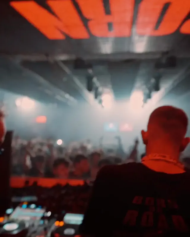 DnB Allstars x 30Hz: Sheffield: DJ facing the Sheffield crowd under white light
