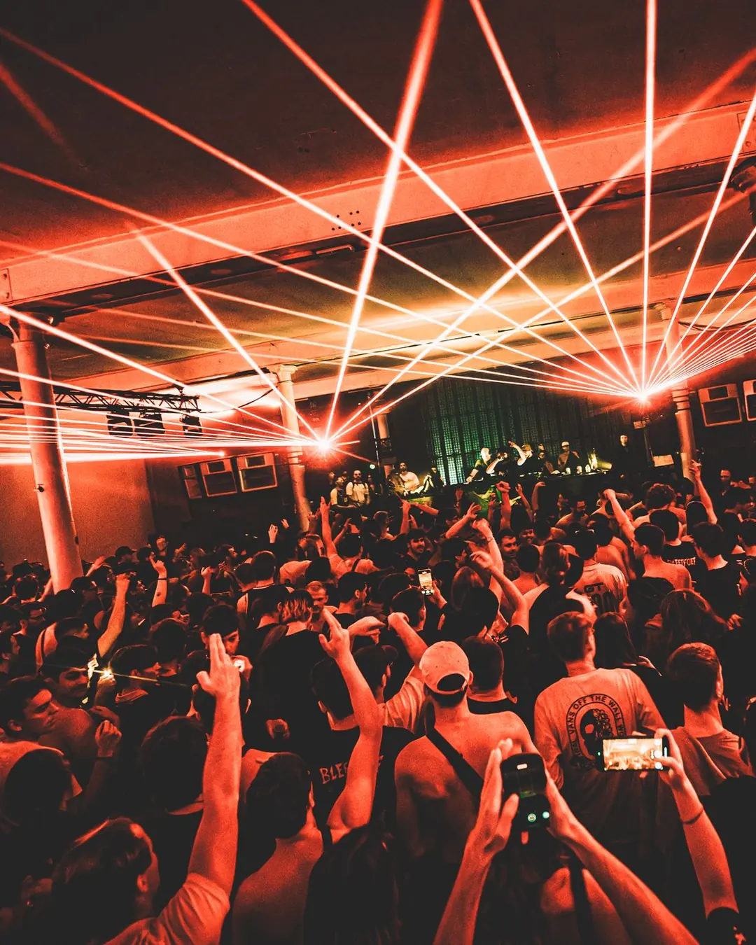 DnB Allstars x Bou’s House: Belgium: Red lasers radiating over packed crowd with hands raised